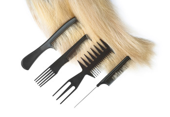 hair with scissors on close up isolated on white background