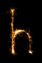 Sparkler firework light alphabet h (Small Letters) at night