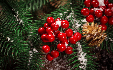 Beautiful Christmas background with the branches of the Christmas tree and snow on wooden background. View with copy space
