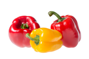 red and yellow peppers isolated on white background