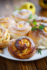 Obraz na płótnie Canvas sweet rolls with quince