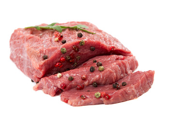 Raw meat and spices on white background.