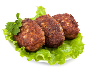 Meat patties with fresh lettuce.