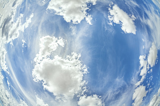 Fisheye lens picture of clouds on blue sky