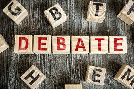 Wooden Blocks With The Text: Debate