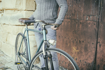 Man with old bike with vintage style