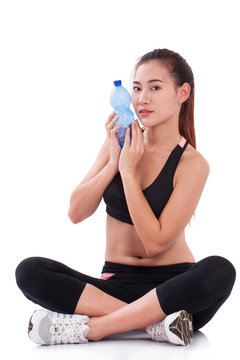Happy woman holding bottle of water over white background