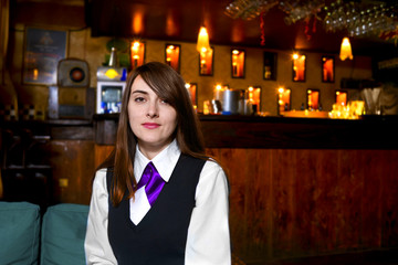 Girl during Christmass posing in a bar