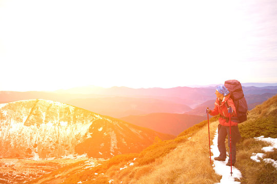 Tired girl with a backpack.