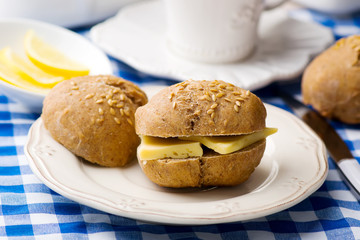 rye buns with cheese for a breakfast