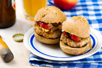 burger with pork  and apple.