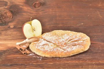 Sweet homemade apple pie with cinnamon and sugar