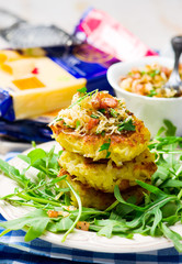 potato fritters with a green salad