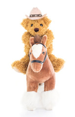 Cowboy Teddy bear riding a horse
