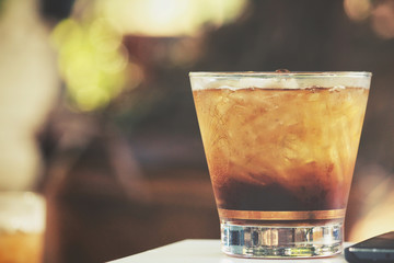 Cola with ice cubes