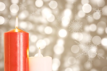 Composite image of hanging snowflakes