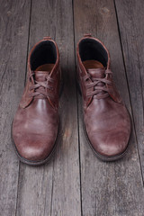 Mens shoes on wooden background