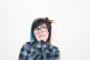 Pretty young alternative woman with big glasses