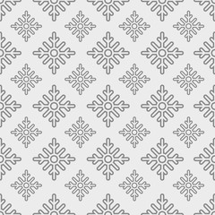 Seamless  pattern of snowflakes on a gray background