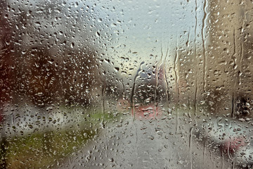 Rain drops covering window glass - 96525581