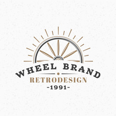 Wooden Wheel. Vintage Retro Design Elements for Logotype, Insignia, Badge, Label. Business Sign Template. Textured Background © antartstock