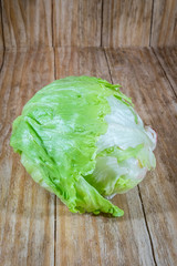 a very fresh lettuce on a wooden table old
