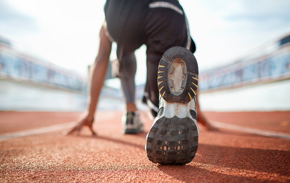 Athlete Runner Feet Running On Treadmill Closeup On Shoe