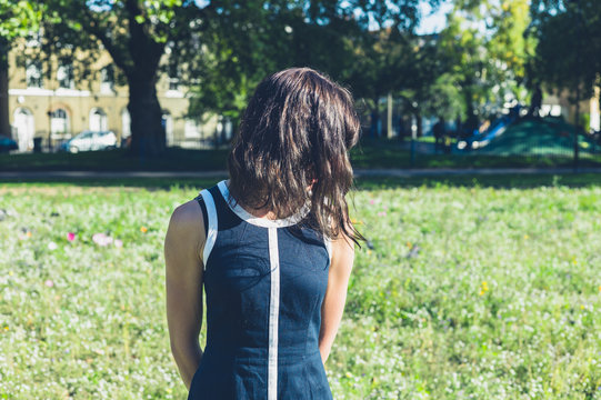 Young woman standing in a meadow