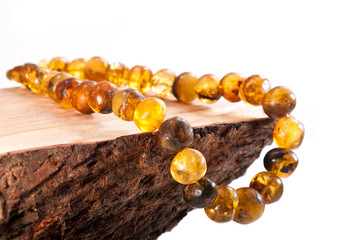 Jewelry made of amber on a white background