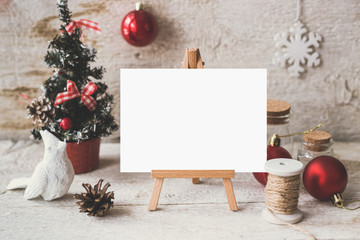Obraz premium Cute vintage christmas new year gifts mockup on wooden background.