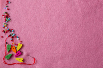 Greeting card with needlework symbols.