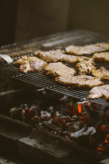 Pork meat chops on barbecue