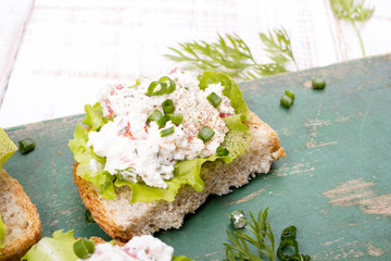 sandwiches with cottage cheese, chives and salad.
