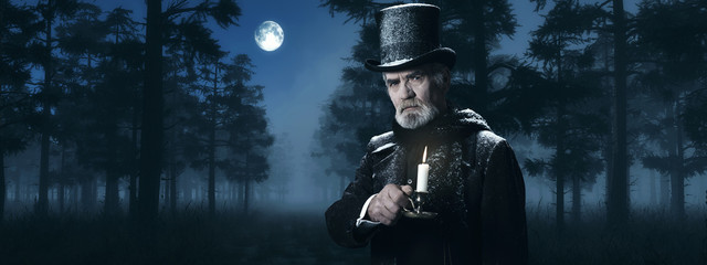 Dickens Scrooge Man with Candlestick in Foggy Winter Forest at M - obrazy, fototapety, plakaty