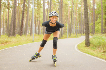 Active woman on roller skates training © Kaspars Grinvalds