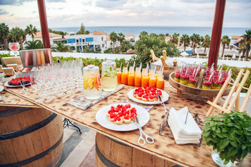 Catering cocktails and desserts in the background of the sea and