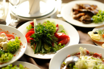 table set service with silverware and glass stemware at restaurant before party