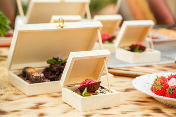 delicious cake in a wooden box