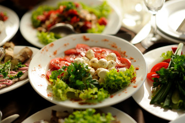 table set service with silverware and glass stemware at restaurant before party