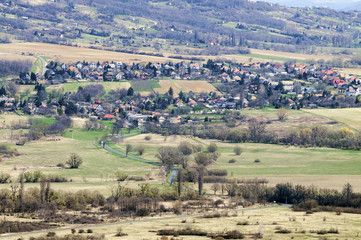 Naklejka premium Sunny landscape of a small village&nbsp;from slightly above