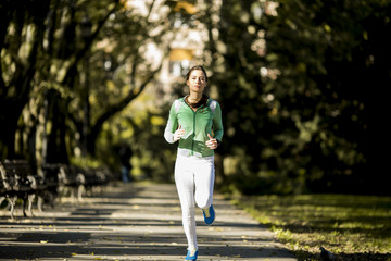 Young woman running in the park