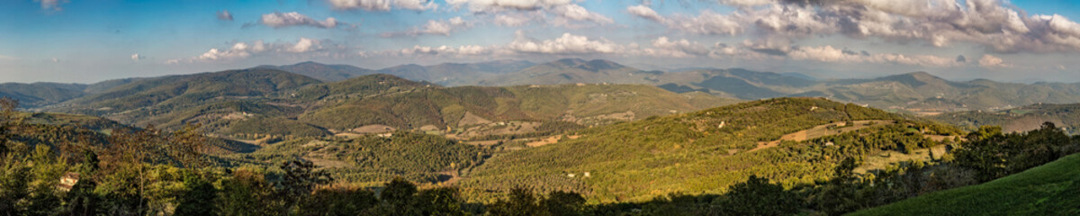 Fototapeta na wymiar Panoramic of Umbrian hills in Italy taken from Preggio