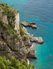 Small cove and turquoise sea on Amalfi coast in Italy