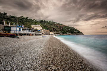 Pebble beach at Marina del Cantone on Amalfi coast in Italy
