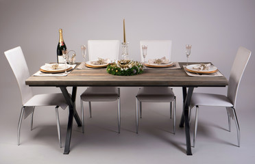 Wooden table setting and decoration for meal time, studio shot