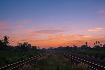 Railway tracks in a Rural Scene with Nice Sunrise