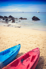 Colorful kayaks on the tropical beach, Yanui Beach