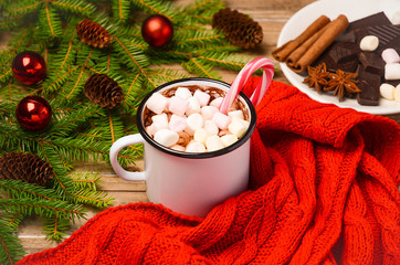 Hot chocolate with marshmallows on the rustic wooden table. Christmas composition.