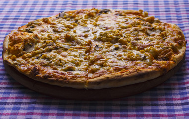 Pizza with meat and sweet corn