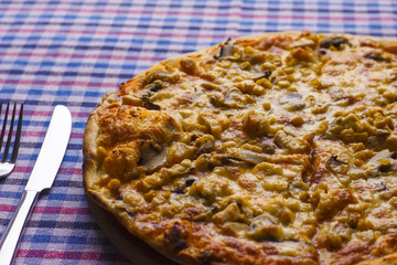 Pizza with meat and sweet corn